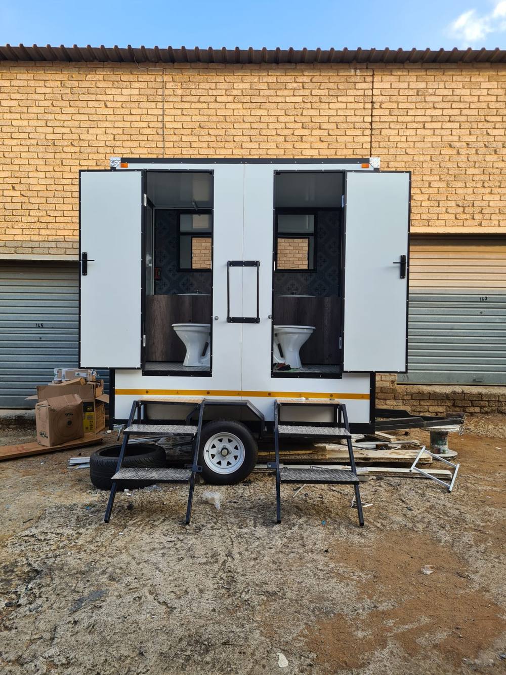 VIP toilet trailer built for events by Ray SteelWorks Design