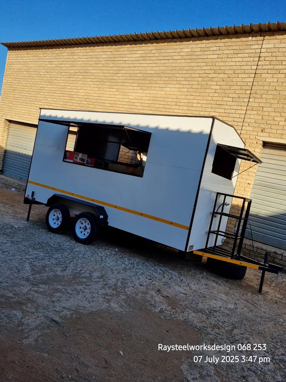 Two custom kitchen trailers at Ray SteelWorks Design
