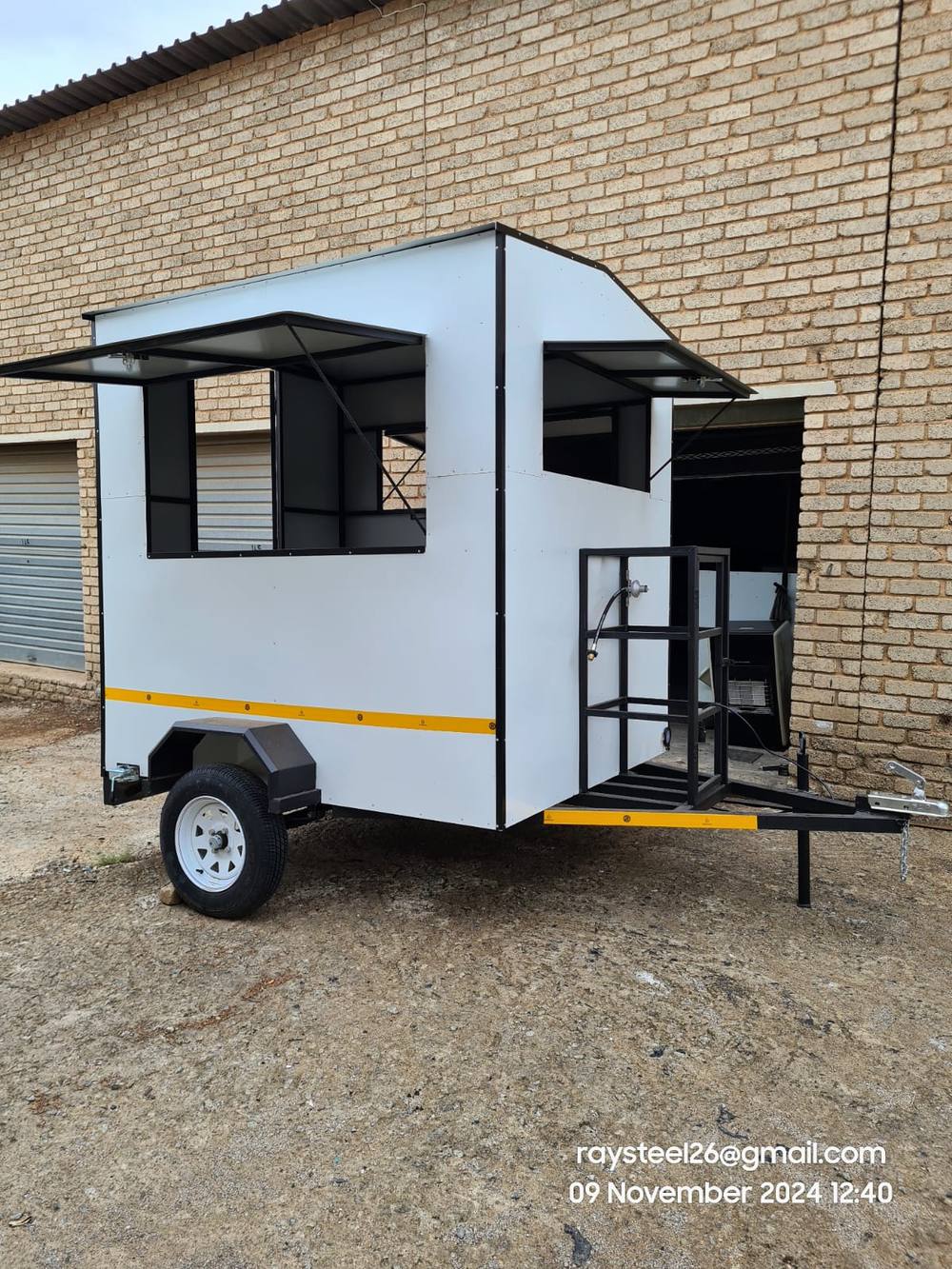 Heavy-duty trailer with awning built by Ray SteelWorks Design